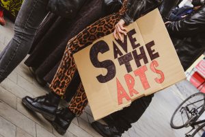 protest placard "Save the Arts"