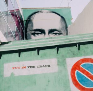 street art of Putin in a skip